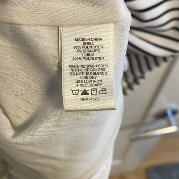 Black and white striped short sleeved dress with black lace on the bottom - Picture 4 of 6